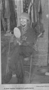 A clown prepares for the circus